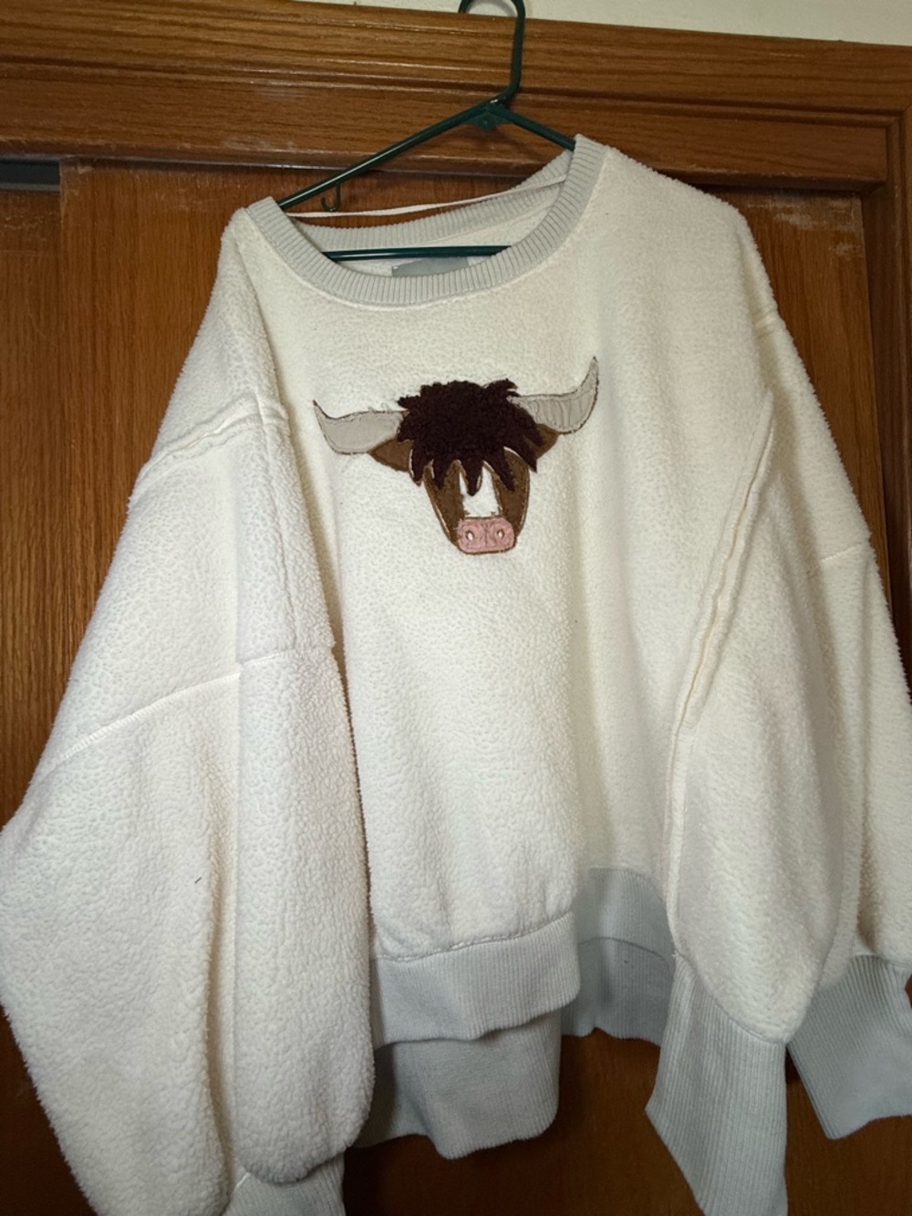 Free People Cream Teddy Pullover with Highland Cow Appliqué